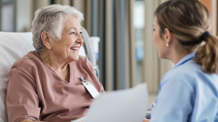 Senior patient discussing Medicare Part A hospital insurance coverage with a nurse before discharge.